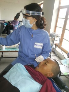 Patricia Providing Oral Healthcare to Child in India